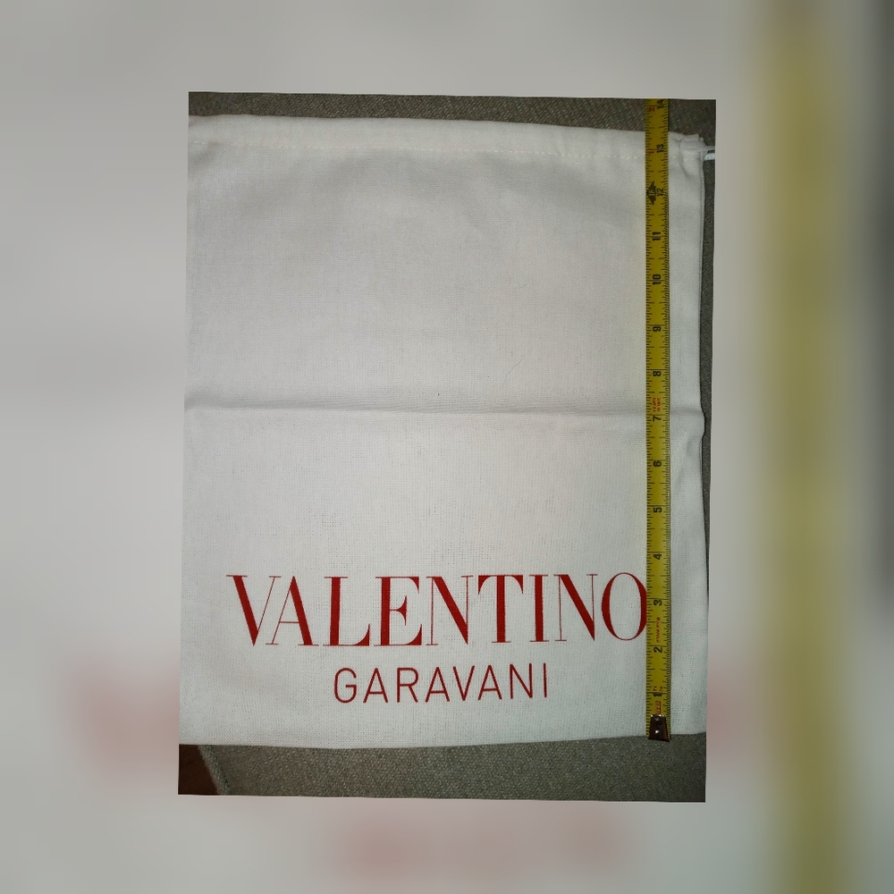 Authentic Valentino jaw string Dust Bag. About 13.5 inches X 12 inch